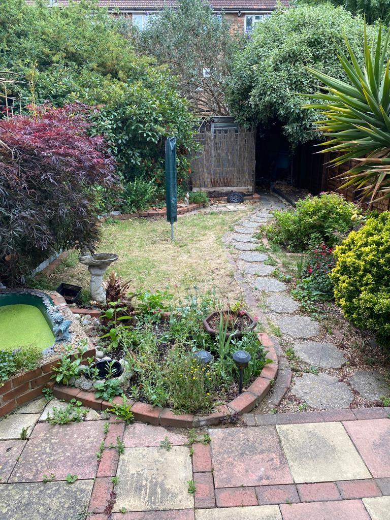 Lot: 44 - MID-TERRACE HOUSE FOR IMPROVEMENT - rear garden